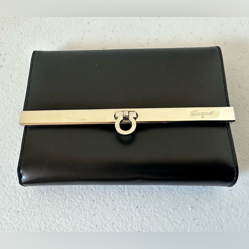 Salvatore Ferragamo black / silver flip wallet